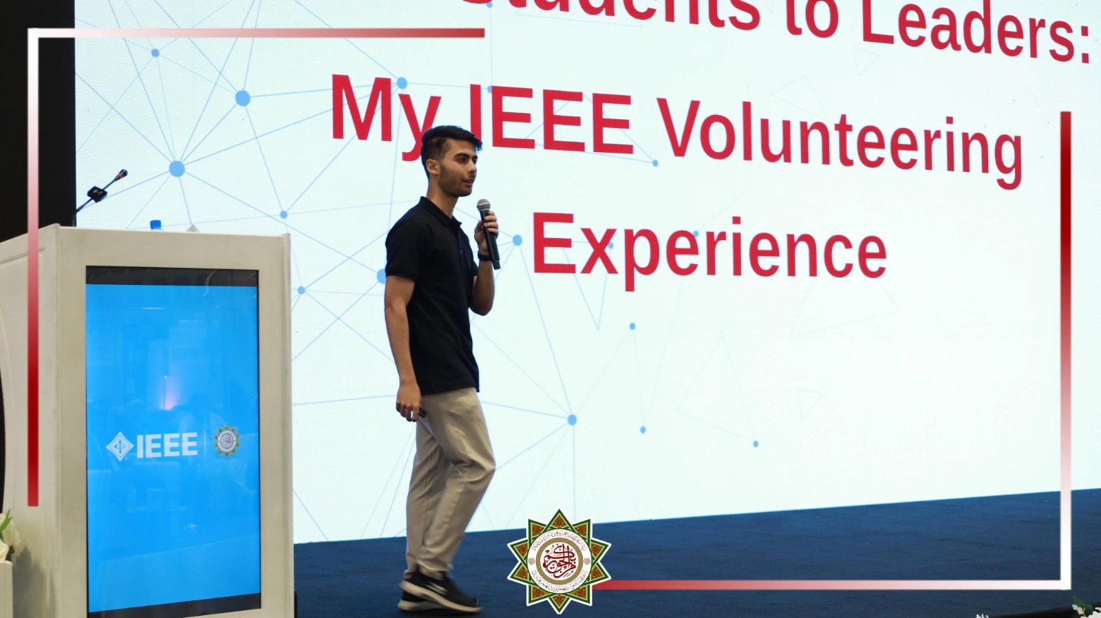 MCC founder presenting his IEEE volunteering experience on stage